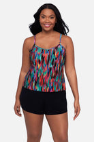 Woman wearing an abstract multicolored printed swim romper