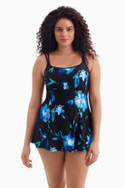 Woman wearing a blue floral printed swim dress