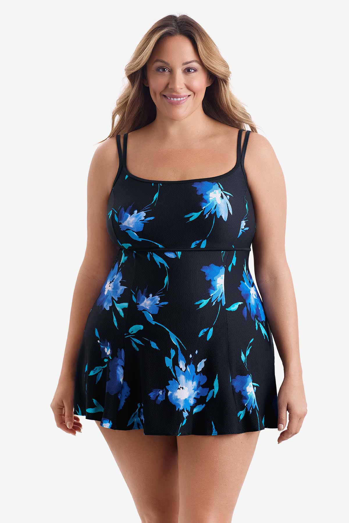 Woman wearing a blue floral printed swim dress