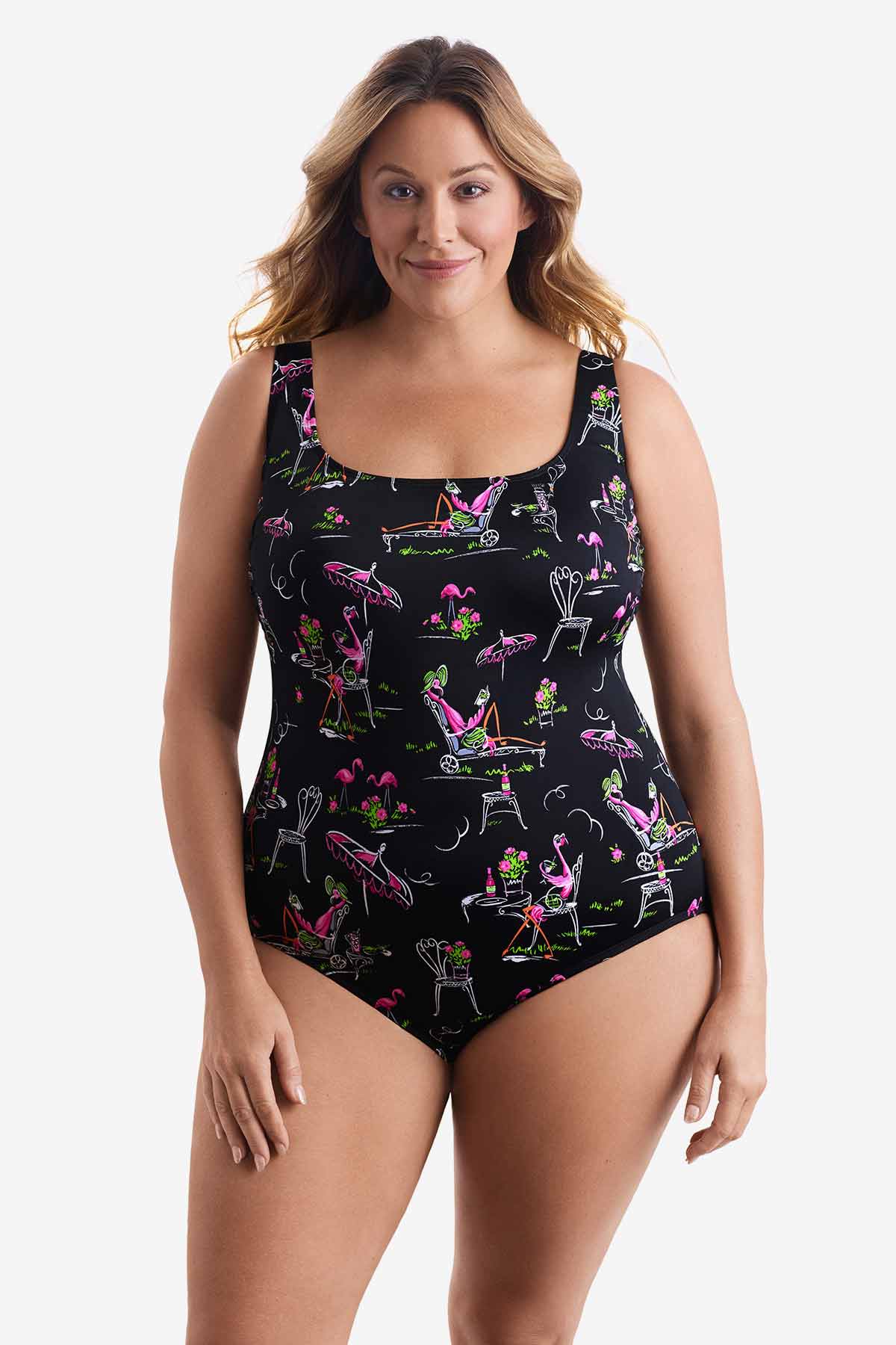 Woman wearing a one-piece swimsuit with a flamingo pattern