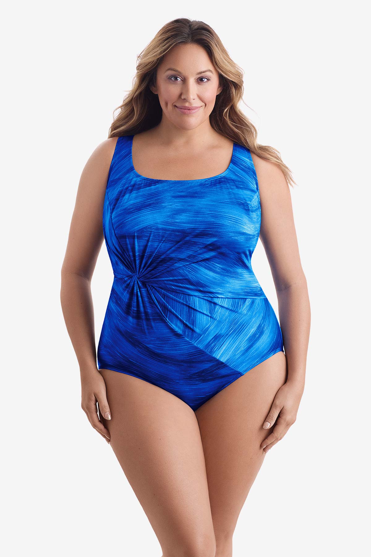 Woman wearing a blue paint brush pattern one-piece swimsuit with a twist on the side