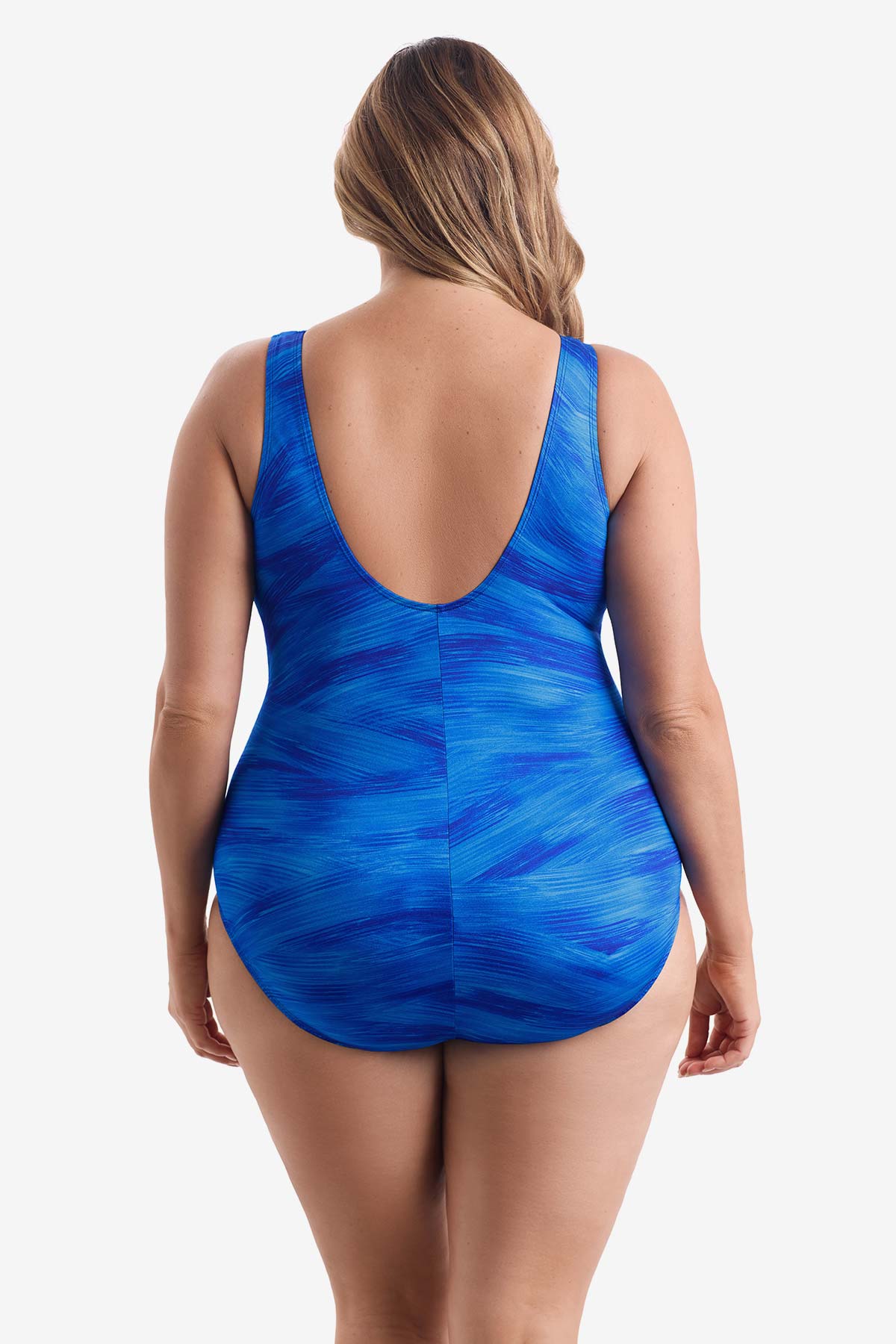 Woman faced away wearing a blue paint brush pattern one-piece swimsuit