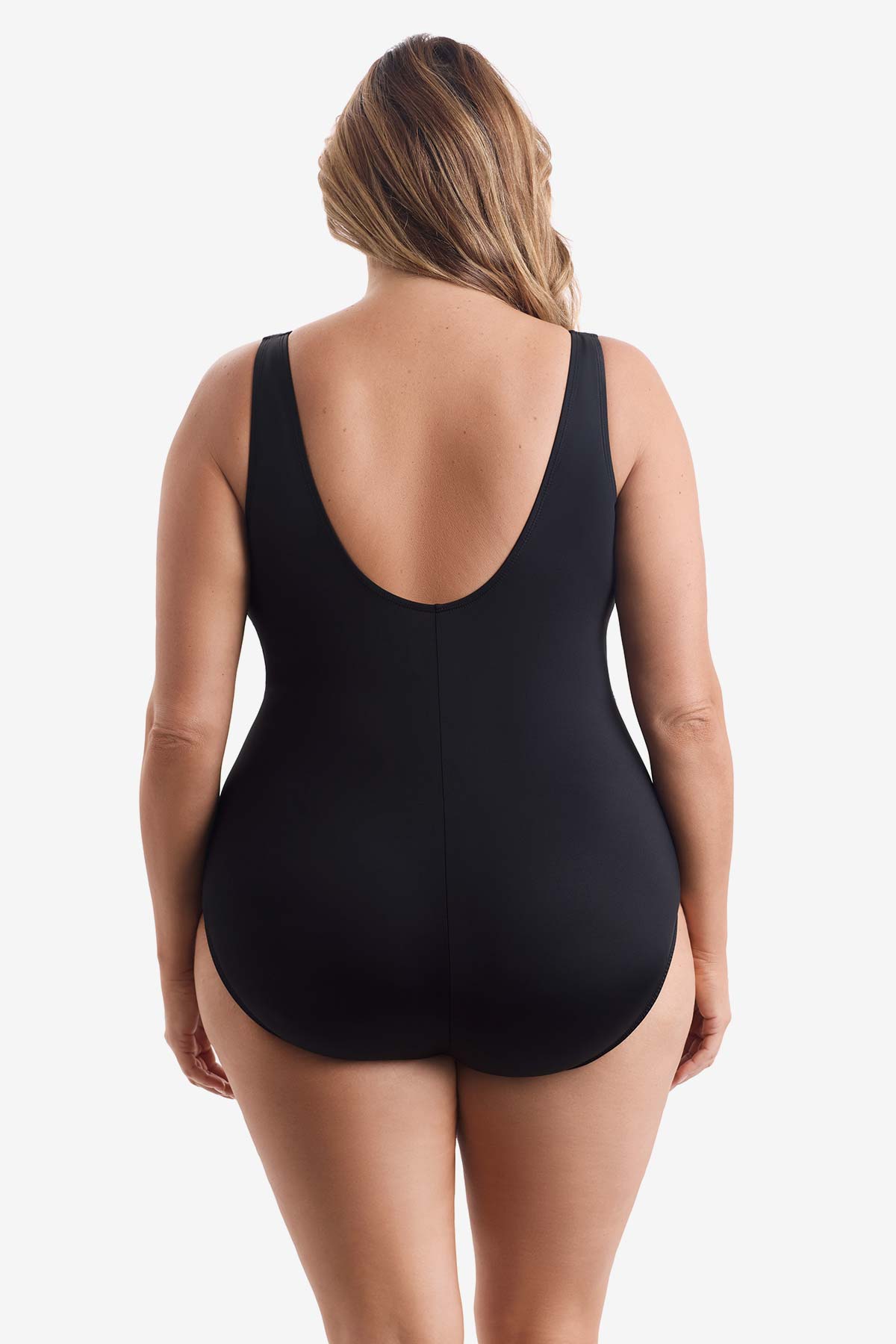Woman wearing a black one-piece swimsuit