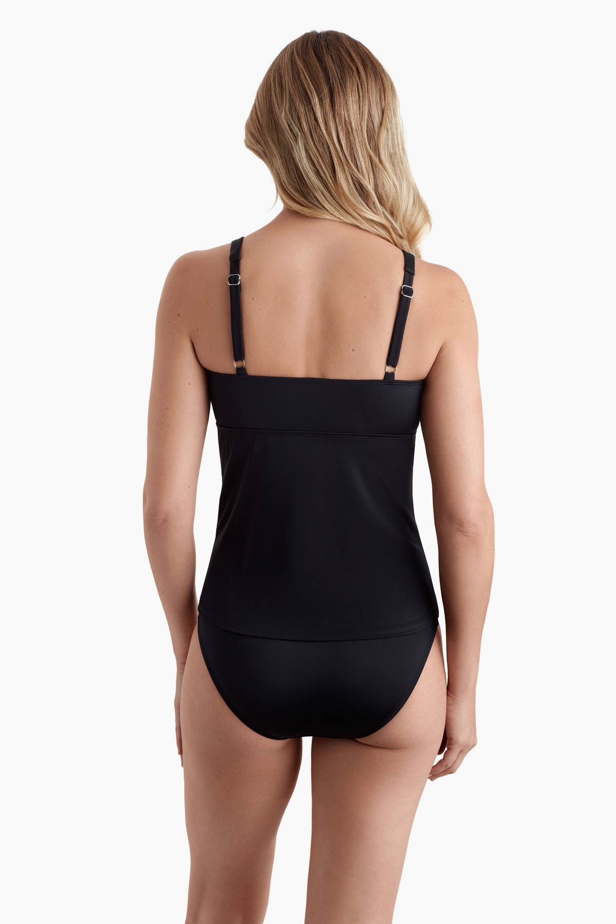 Woman faced away wearing a black one-piece swimsuit 