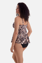 Woman turned left wearing a brown butterfly wing printed tankini top