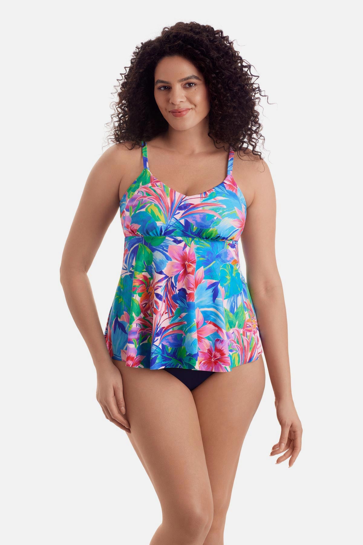 Woman wearing a multicolor floral tankini top