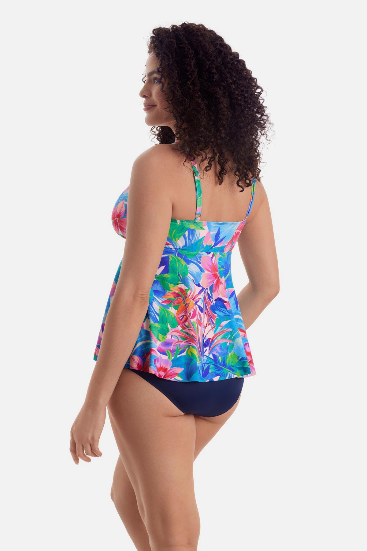 Woman turned left wearing a multicolor floral tankini top