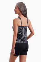 Woman turned left to show detail of leaf print