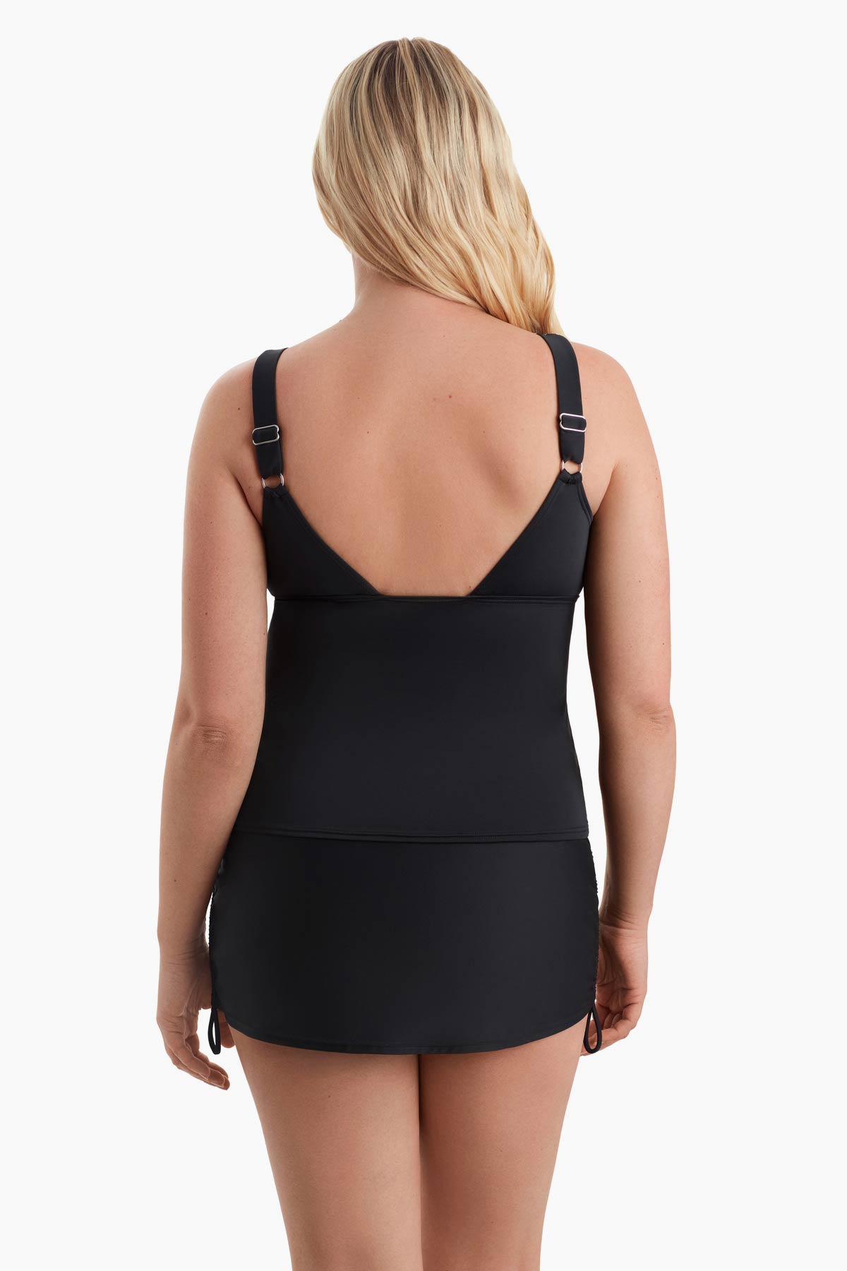 Woman faced away to show strap details of tankini top