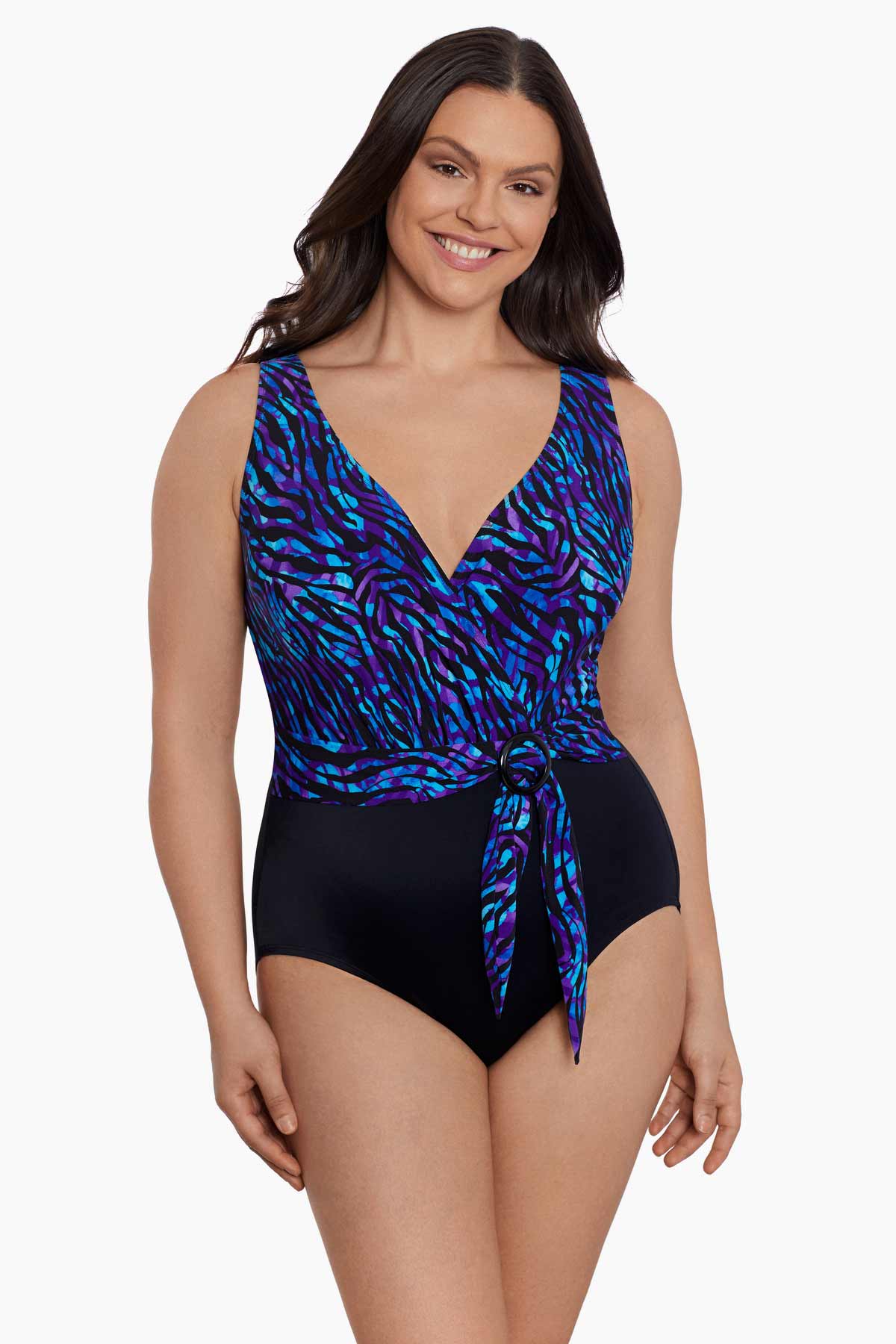 Woman wearing a black and blue safari printed one-piece swimsuit