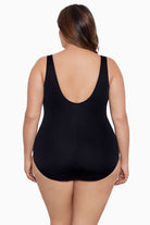 Woman faced away wearing a fan tank one-piece swimsuit