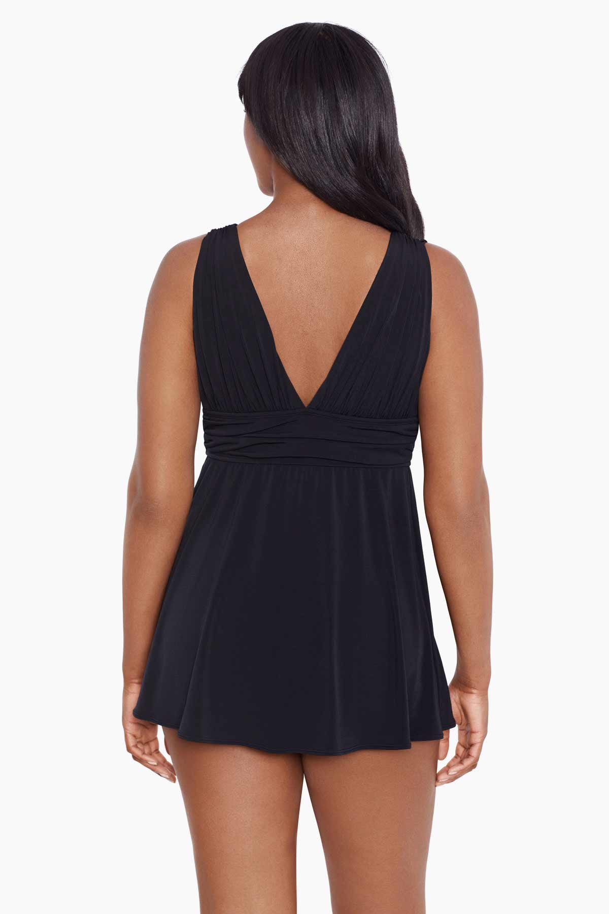 Woman faced away wearing a black V neck swim dress