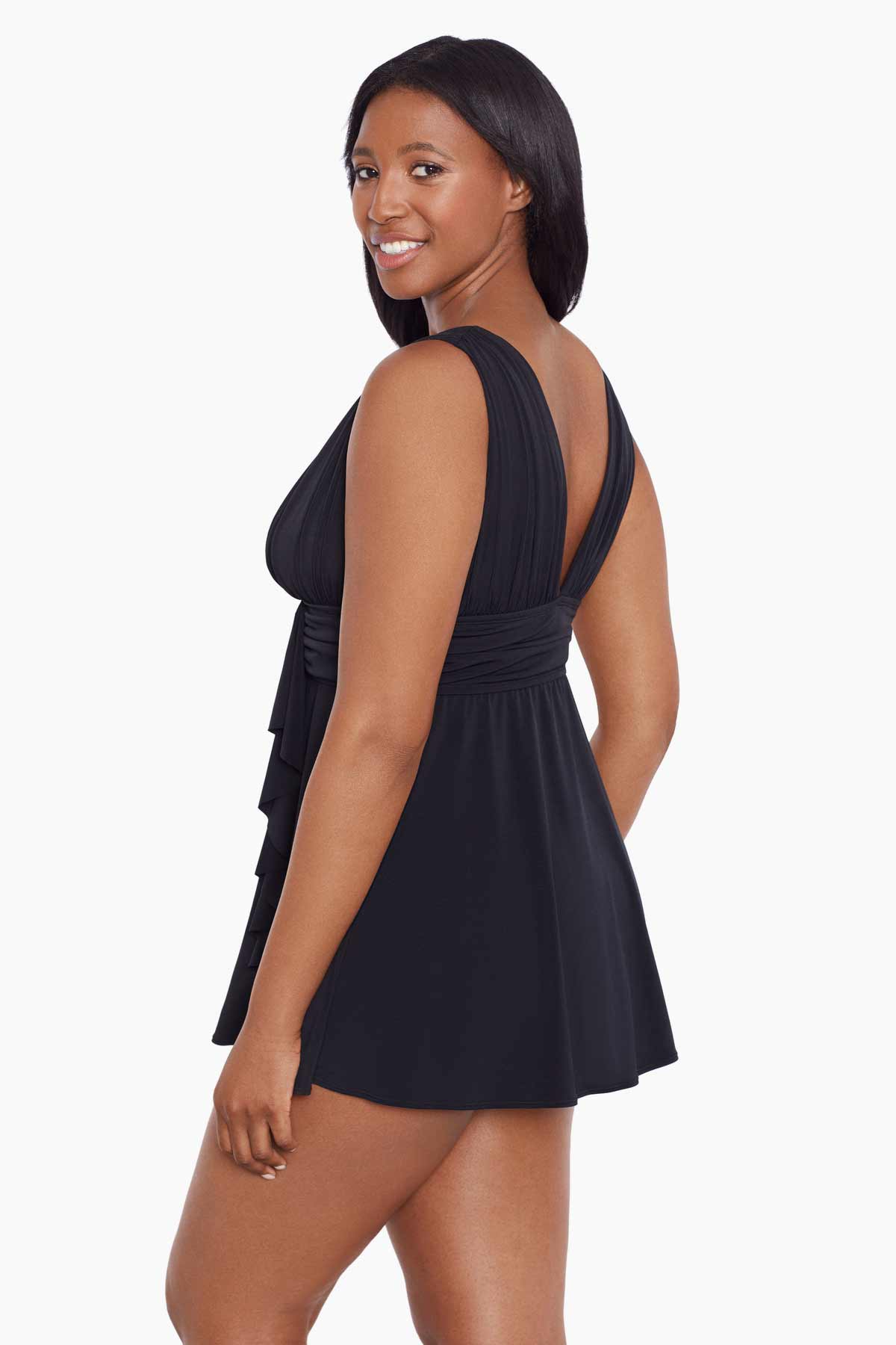 Woman turned left wearing a black V neck swim dress