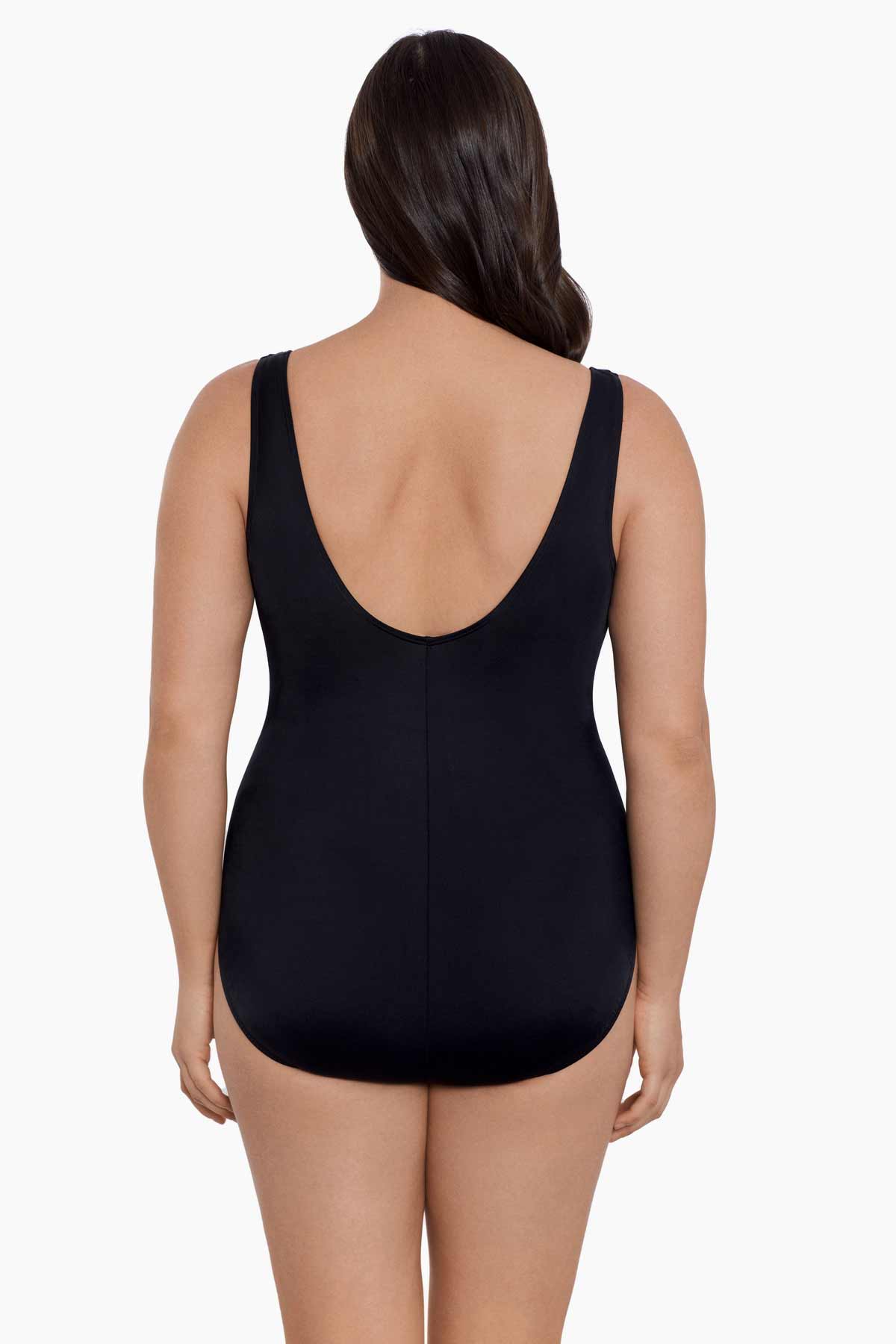 Woman faced away wearing a one-piece swimsuit