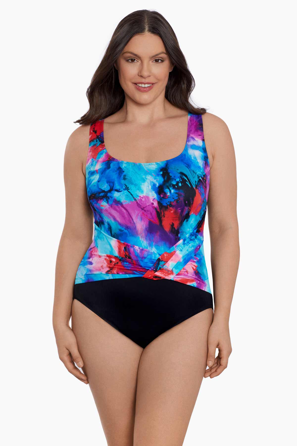 Woman wearing a blue and pink watercolor print one-piece swimsuit