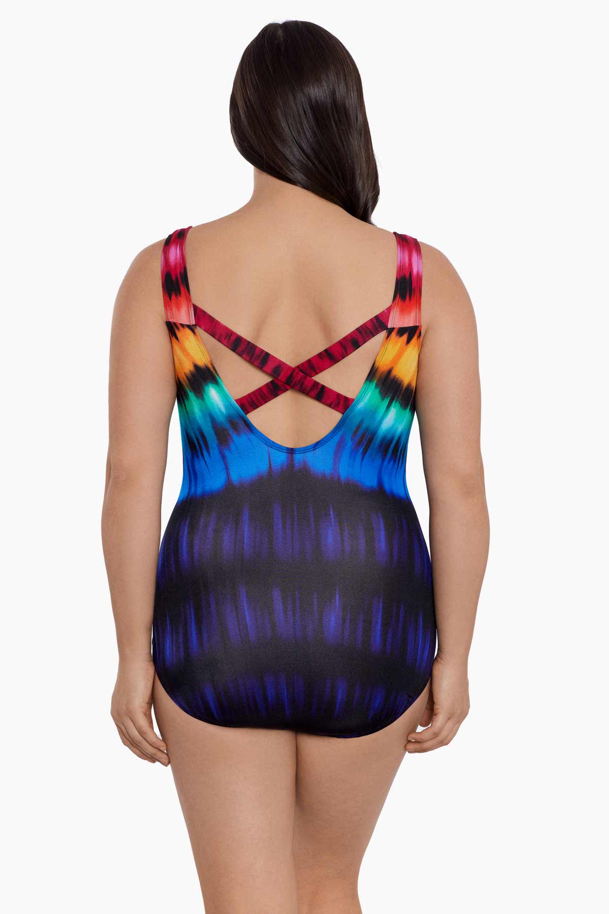 Woman faced away wearing a rainbow tie dye one-piece swimsuit