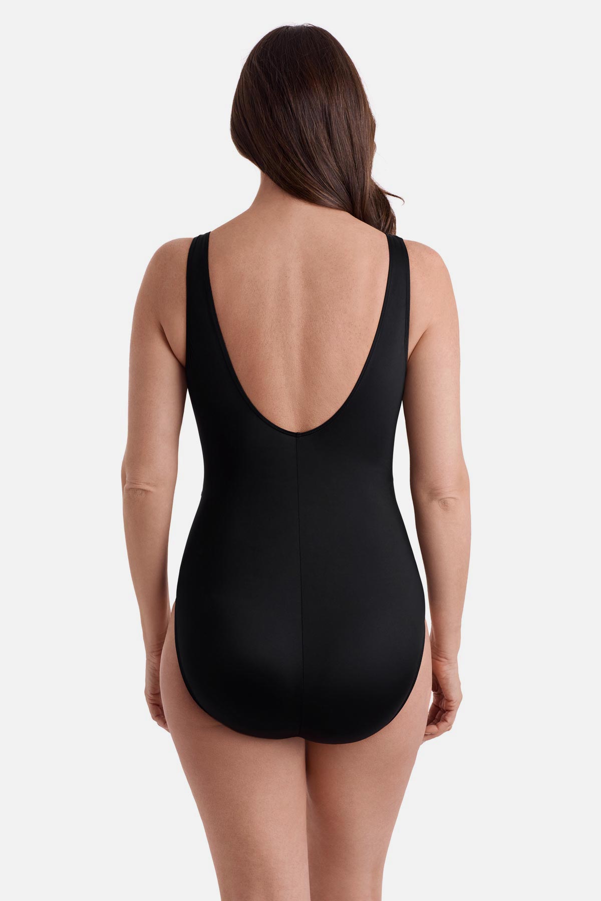Woman turned away wearing a multicolor floral one-piece swimsuit 
