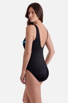 Woman turned left wearing a black swimsuit with gradient blue streaks