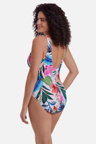 Woman turned left wearing a multicolored floral printed one-piece swimsuit 