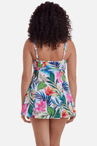 Woman turned away wearing a multicolored floral printed swim dress