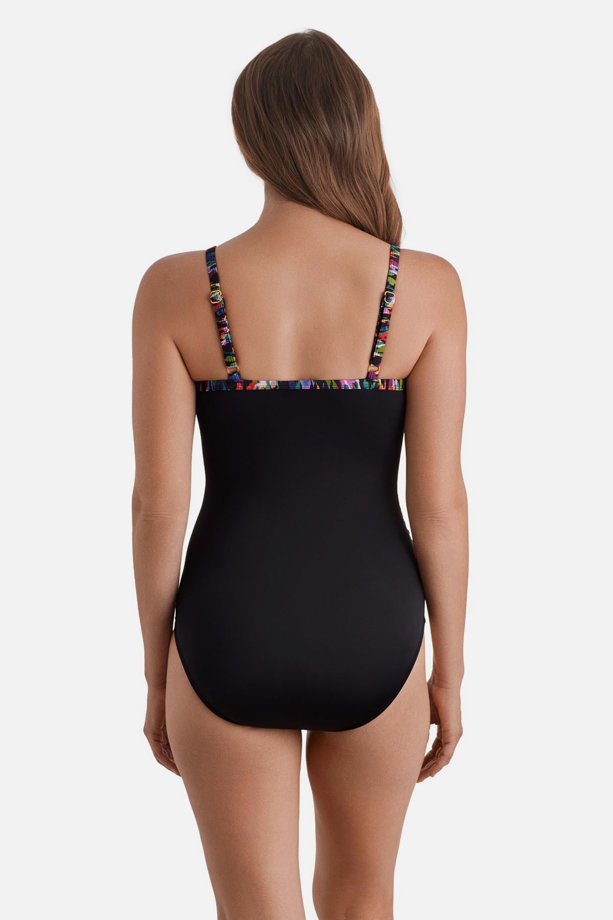 Woman turned away wearing a multicolored abstract printed wrap one-piece swimsuit