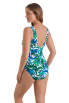 Woman turned left wearing a blue and green floral printed square neck one-piece swimsuit