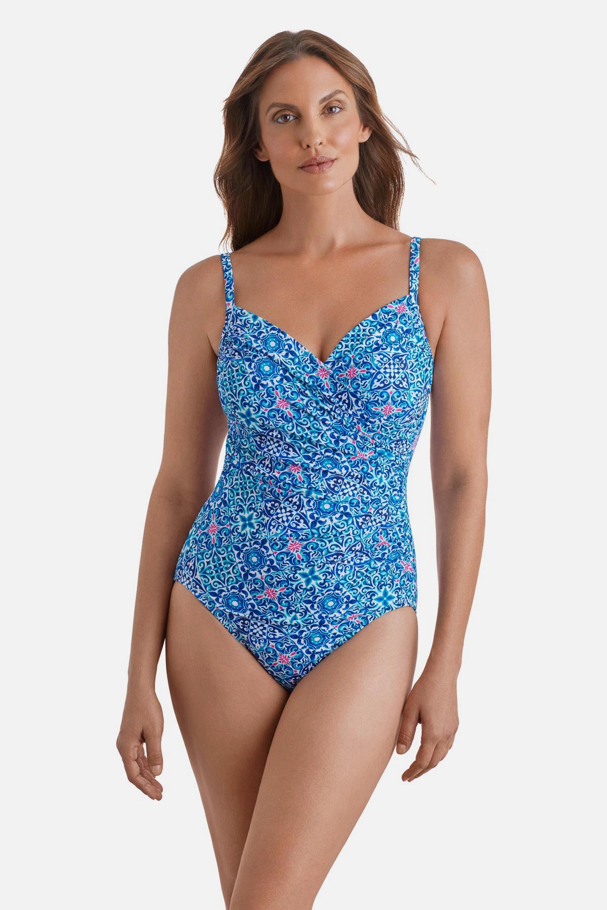 Woman wearing a blue tile print one-piece swimsuit