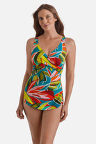 Woman wearing a multicolored abstract printed sarong one-piece swimsuit