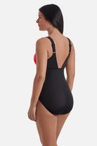 Woman turned left wearing a multicolor gradient one-piece swimsuit 