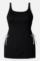 Black swim dress with white piping/edges