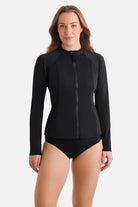 Woman wearing a black zip up sunshirt