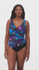 Woman wearing a blue and gold floral printed one-piece swimsuit