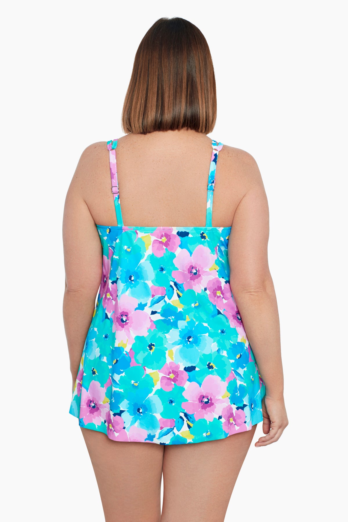 Woman turned away wearing a multicolored floral print one-piece swimsuit