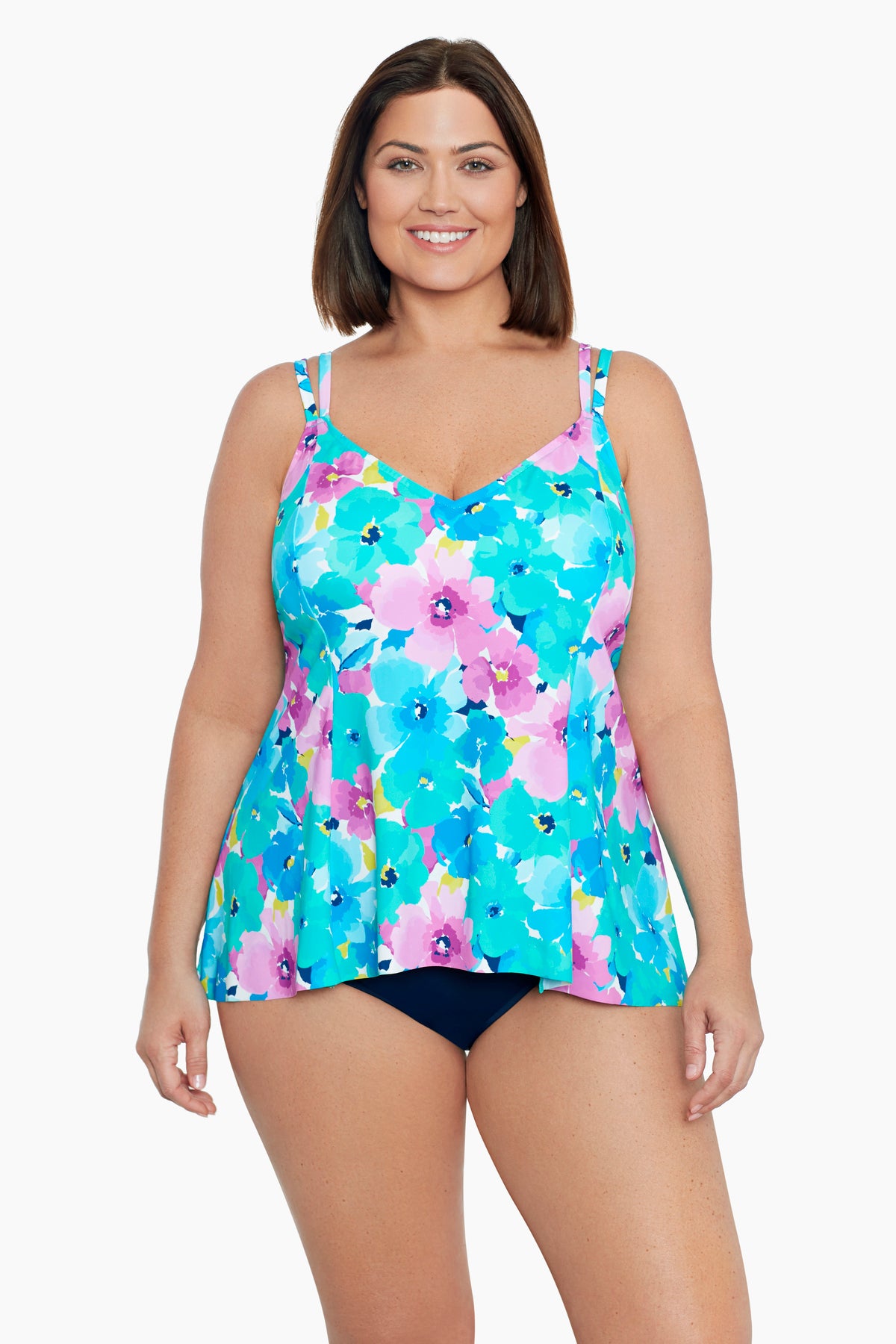 Woman wearing a multicolored floral print one-piece swimsuit